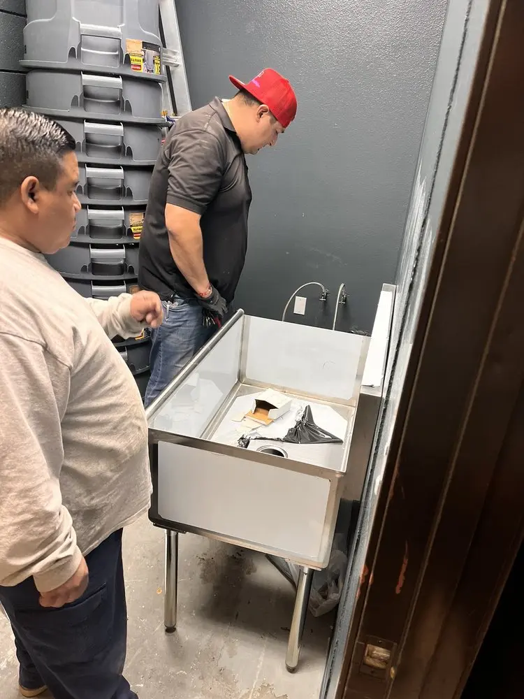 Commercial plumbing and sink installation in Schofer